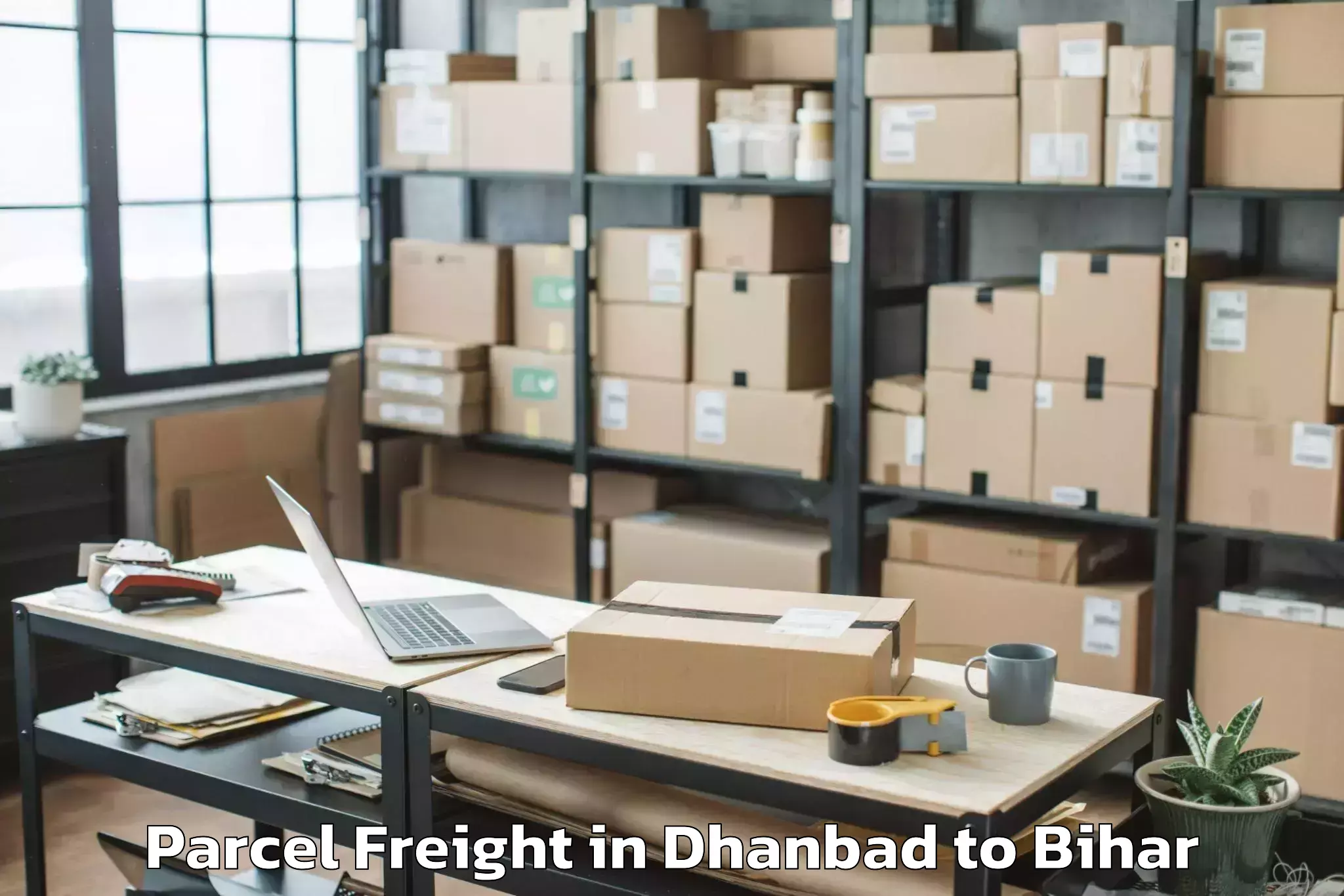 Dhanbad to Tetiha Bambor Parcel Freight Booking